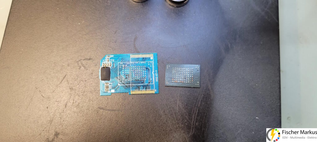 defekte gebogene SD Karte mit abgerissenen Lötpads